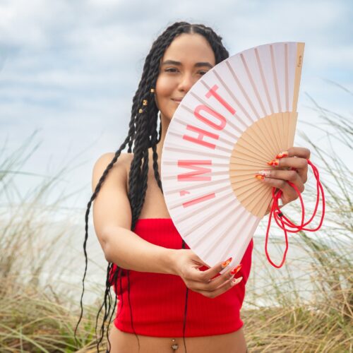 Fisura I'm Hot Fan Beige and Red shown in use
