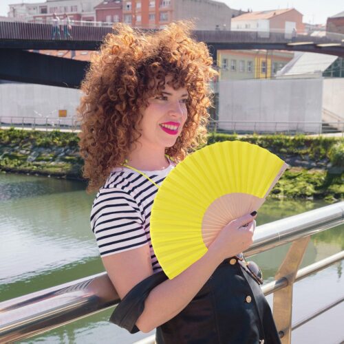 Fisura Lima Fan Yellow shown in use