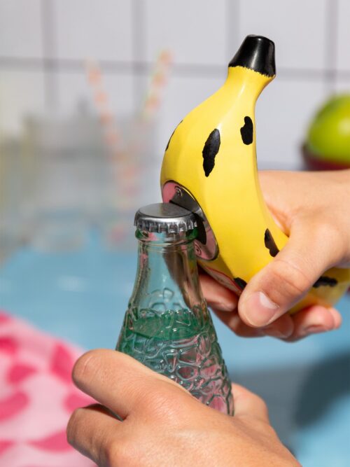 DOIY Banana Bottle Opener Large opening a bottle