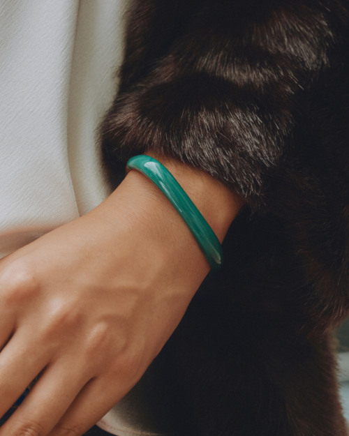 Edblad Lore Bangle Gold/Green – worn on the wrist