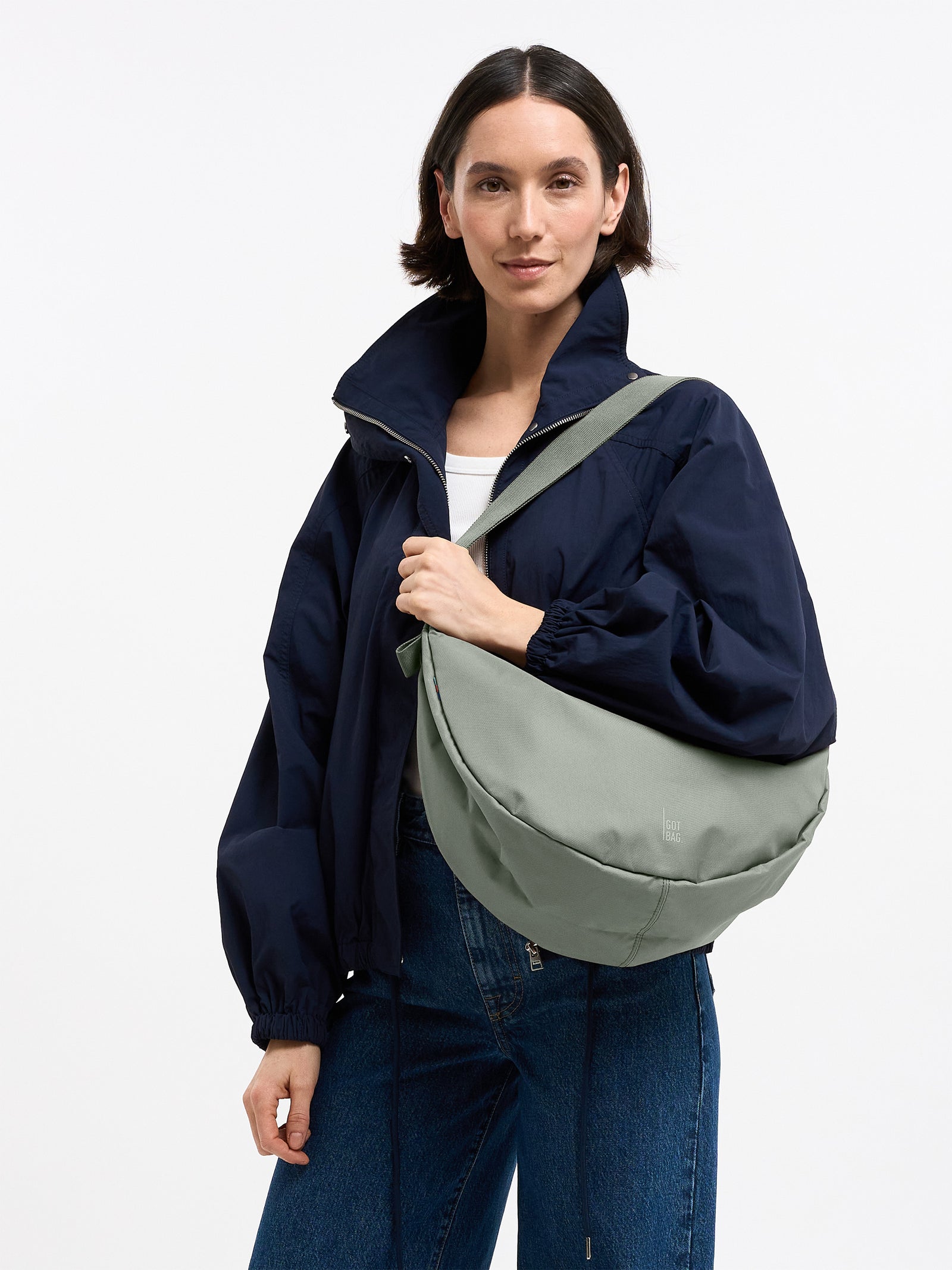Got Bag Moon Bag Large Bass worn crossbody by a woman