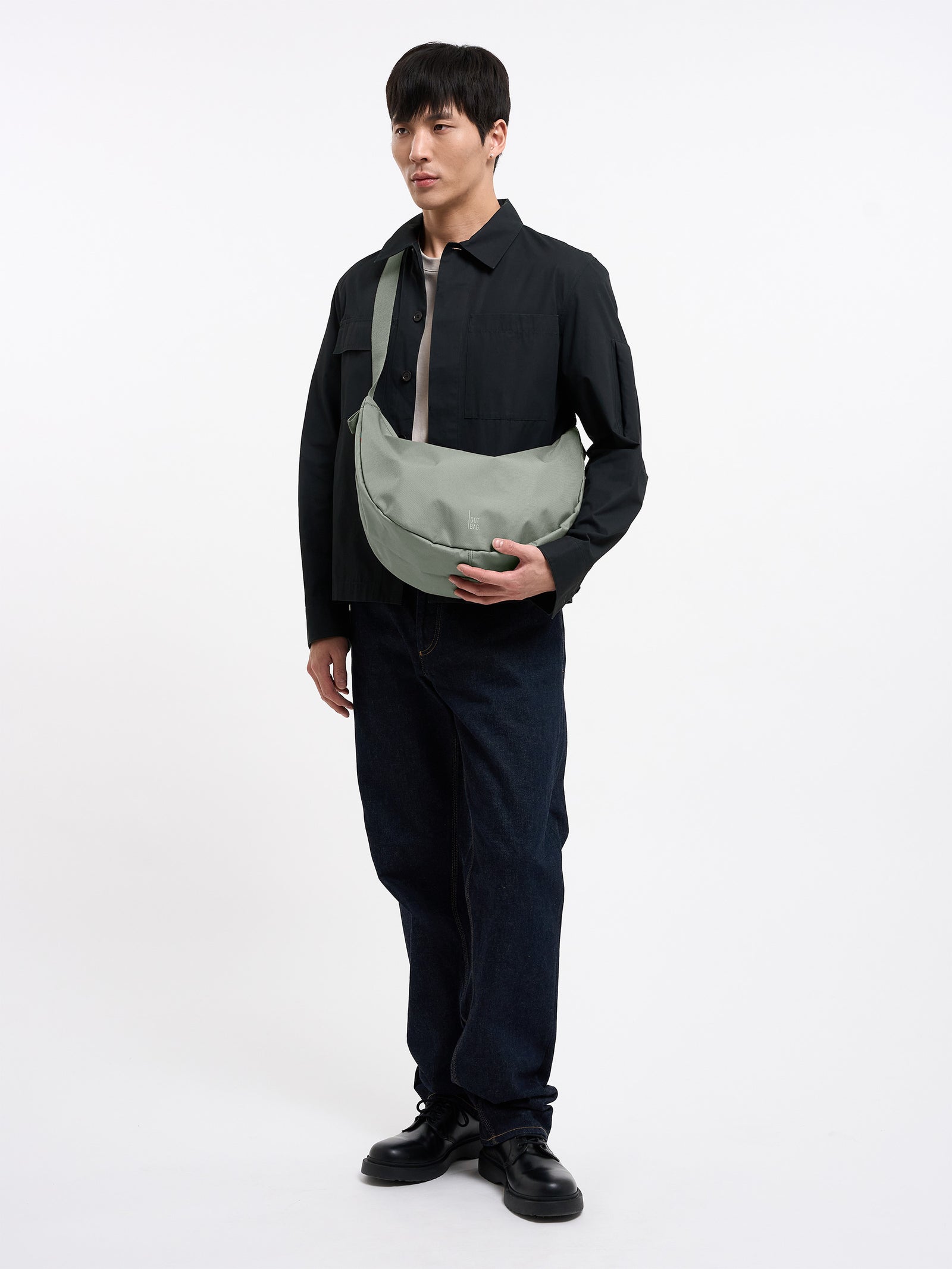 Got Bag Moon Bag Large Bass worn crossbody by a man