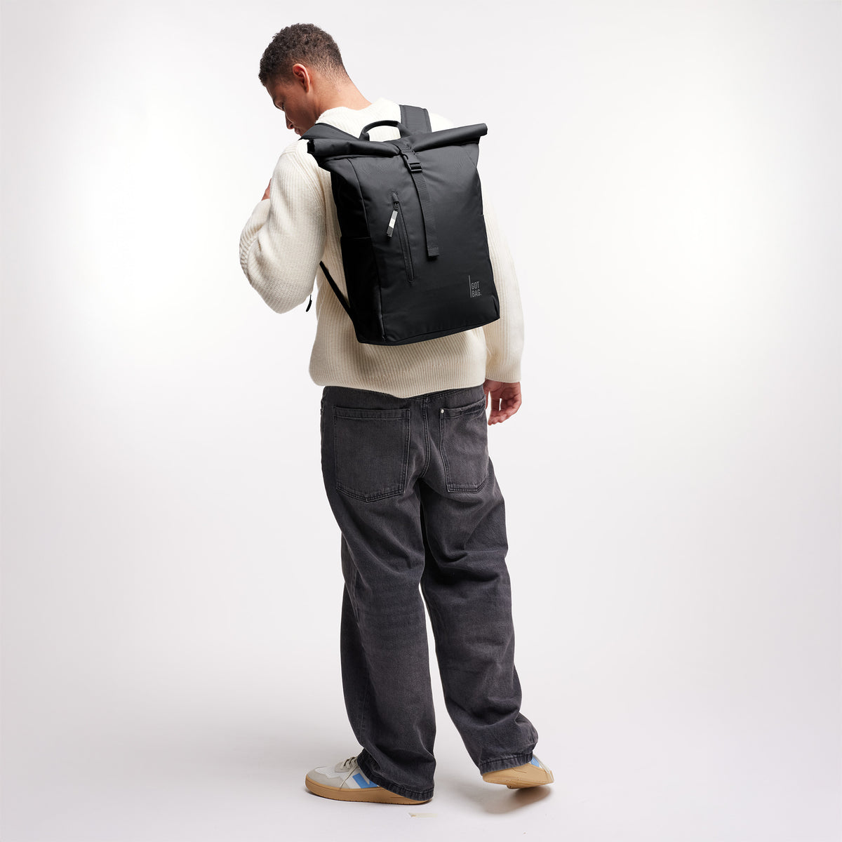 Got Bag Rolltop Easy Monochrome Black worn by a model from the back