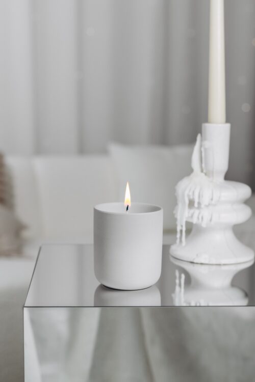 o k o Scented Candle Lavender, 220 g in an interior setting