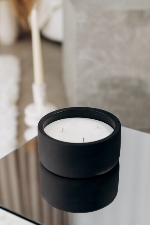 o k o Scented Candle Lemon, 220 g in an interior setting