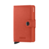 Secrid Miniwallet Original Orange closed front view on a pure white background