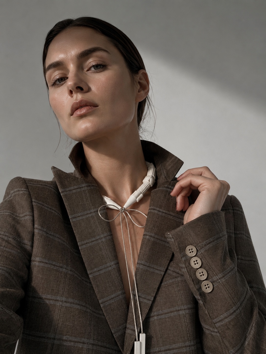 THE AIR Necklace Marshmallow worn as a choker with cords at the front