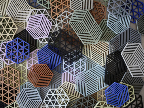 Zone Denmark Hexagon ja Triangles kuumaalused eri värvides, sealhulgas Pear